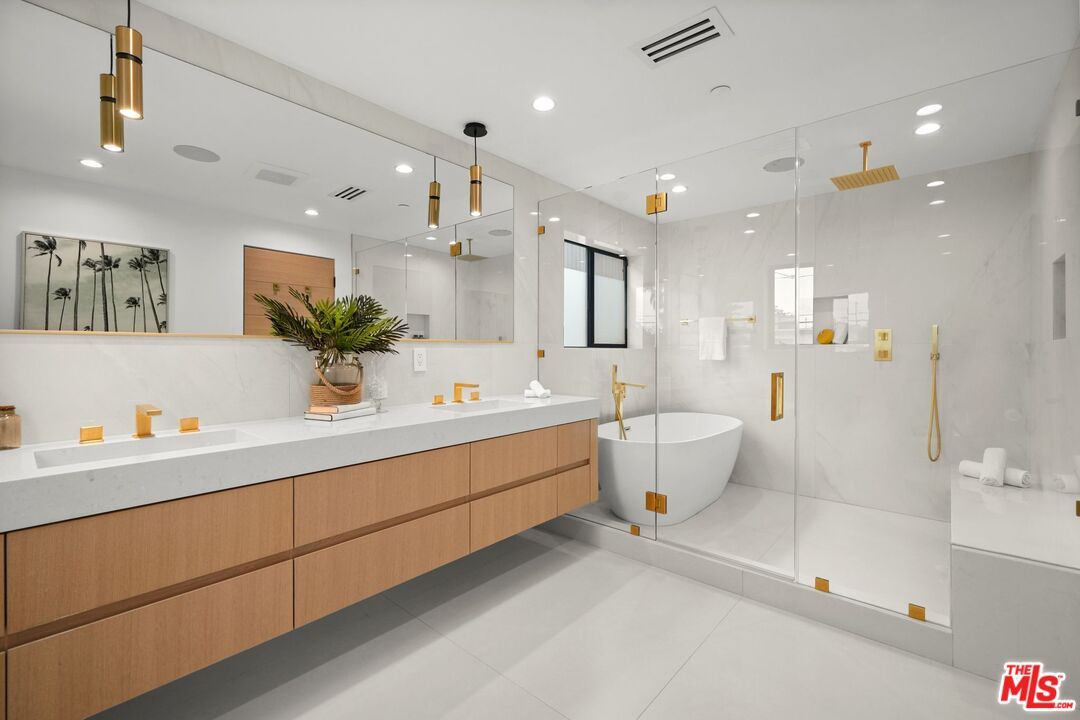 Bathroom, Dual Sink Vanities, Free Standing Baths, Glass Shower, Interior, Marble Walls, Pendant Lights, Recessed Lighting