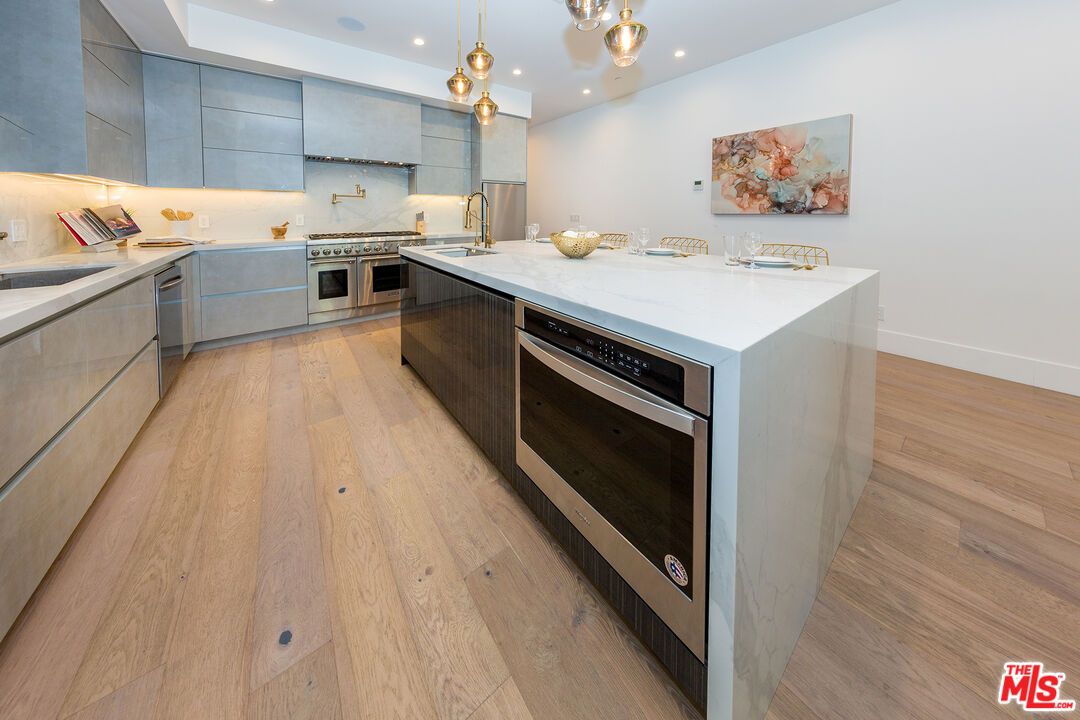 Interior, Kitchen, Pendant Lights, Recessed Lighting, Stainless Steel Appliances, Wood Texture Flooring