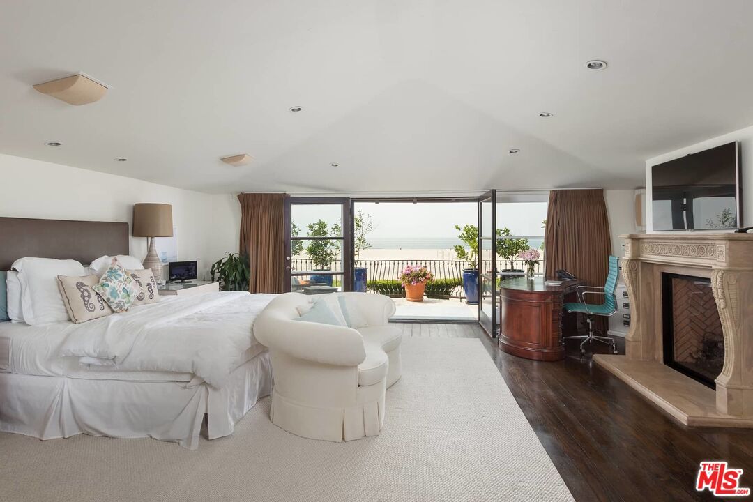 Bedroom, Fireplace, Interior, Recessed Lighting, Water, Wood Texture Flooring
