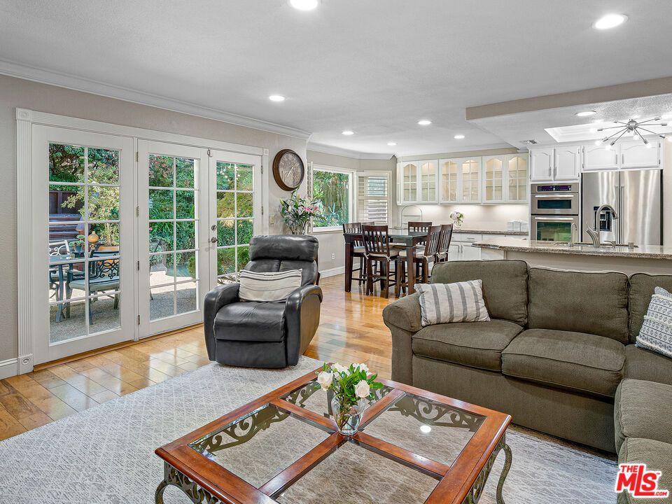 Dining room, Interior, Kitchen, Living room, Recessed Lighting, Stainless Steel Appliances, Wood Texture Flooring