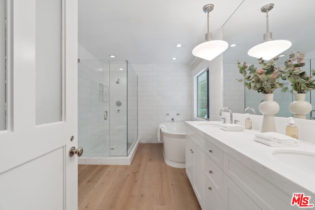 Bathroom, Dual Sink Vanities, Glass Shower, Interior, Pendant Lights, Recessed Lighting, Wood Texture Flooring