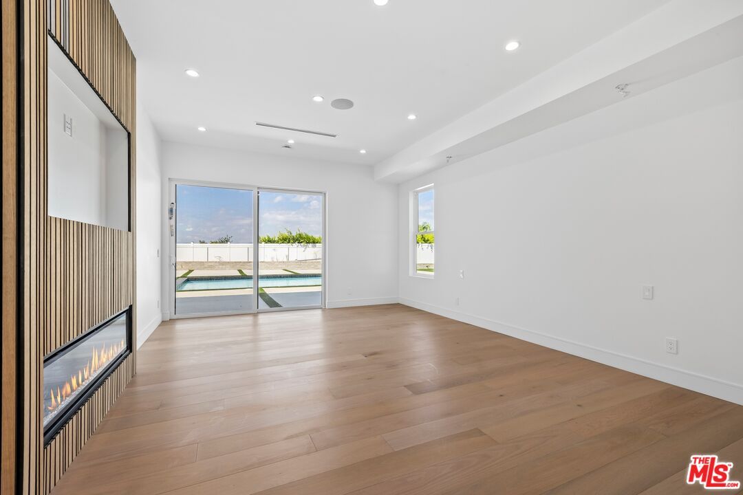 Empty room, Fireplace, Interior, Recessed Lighting, Wood Texture Flooring