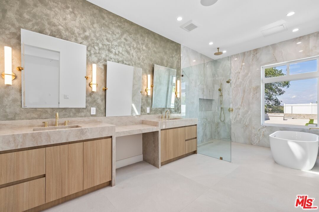 Bathroom, Dual Sink Vanities, Free Standing Baths, Glass Shower, Interior, Marble Walls, Recessed Lighting