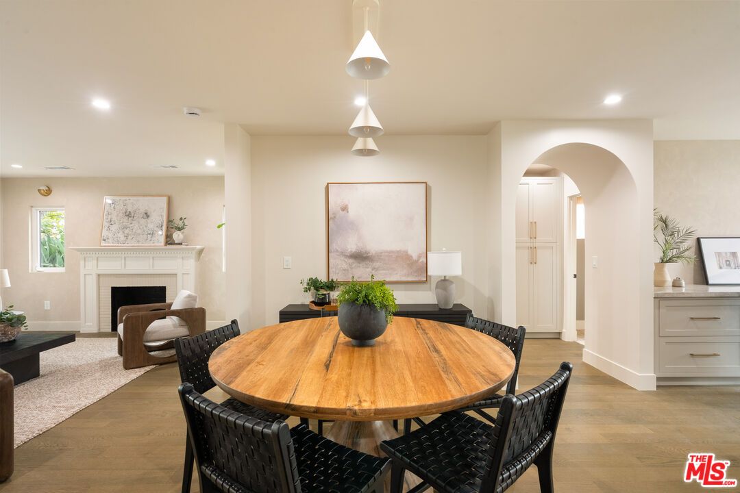Dining room, Fireplace, Interior, Pendant Lights, Recessed Lighting, Wood Texture Flooring
