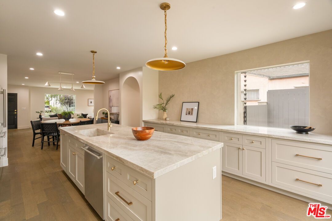 Dining room, Interior, Kitchen, Pendant Lights, Recessed Lighting, Stainless Steel Appliances, Wood Texture Flooring