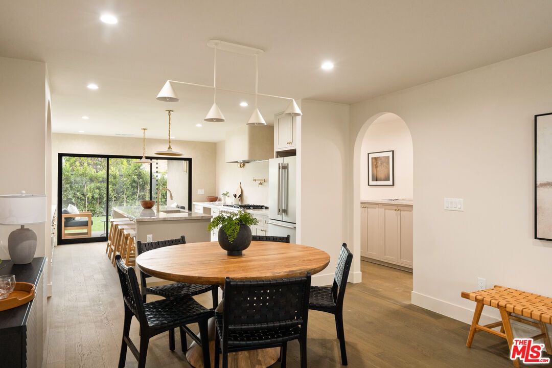 Dining room, Interior, Kitchen, Pendant Lights, Recessed Lighting, Stainless Steel Appliances, Wood Texture Flooring
