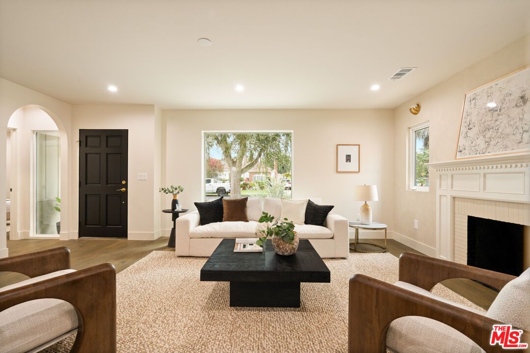 Fireplace, Interior, Living room, Recessed Lighting, Wood Texture Flooring