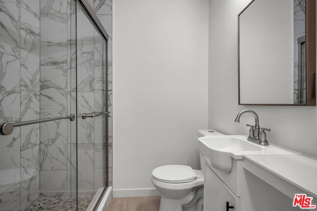 Bathroom, Glass Shower, Interior, Marble Walls, Wood Texture Flooring