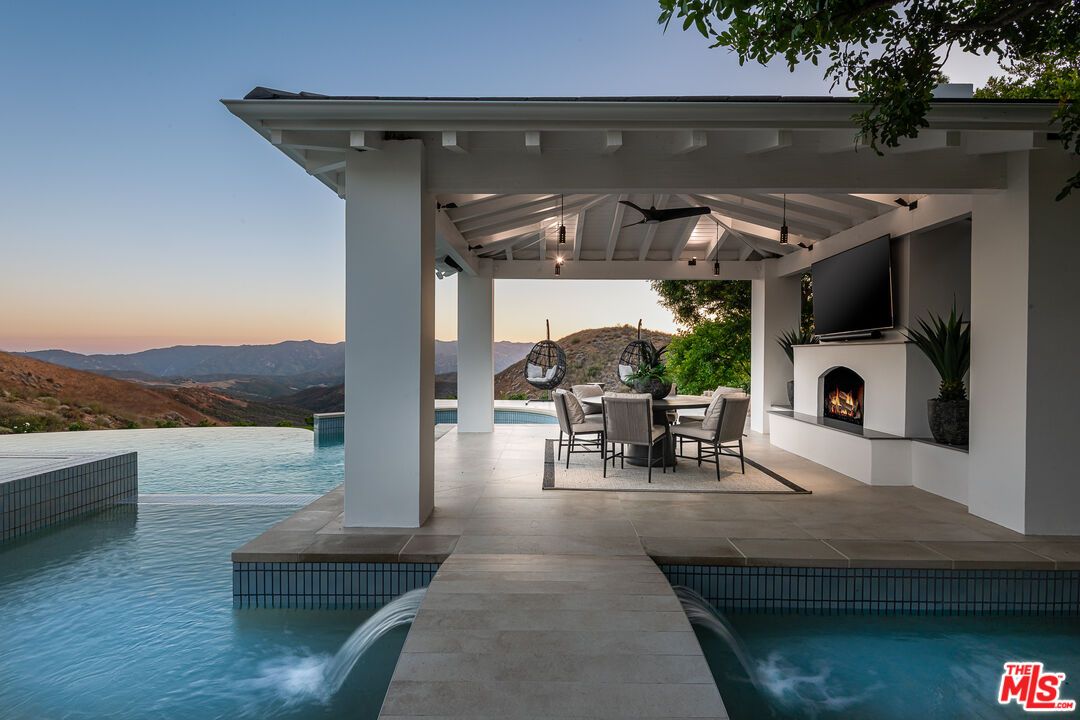Exterior, Fireplace, Pool