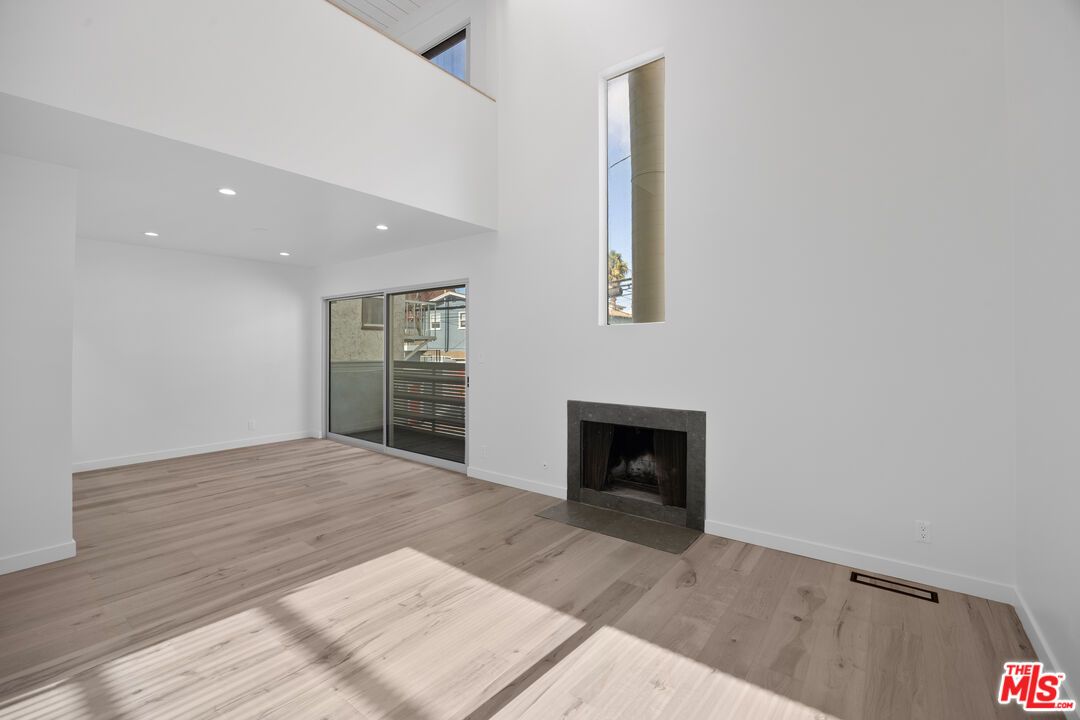 Empty room, Fireplace, Interior, Recessed Lighting, Wood Texture Flooring