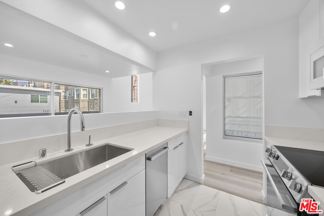 Interior, Kitchen, Marble, Recessed Lighting, Stainless Steel Appliances