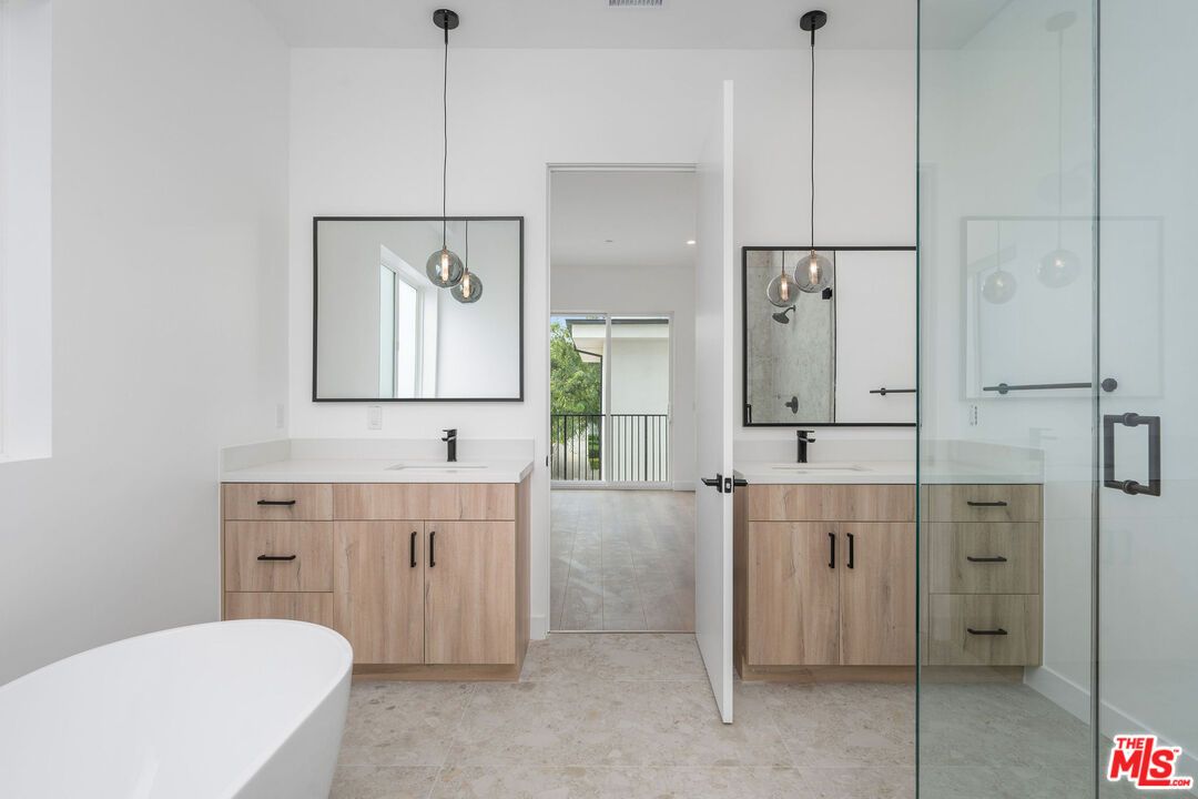 Bathroom, Dual Sink Vanities, Free Standing Baths, Glass Shower, Interior, Pendant Lights, Recessed Lighting