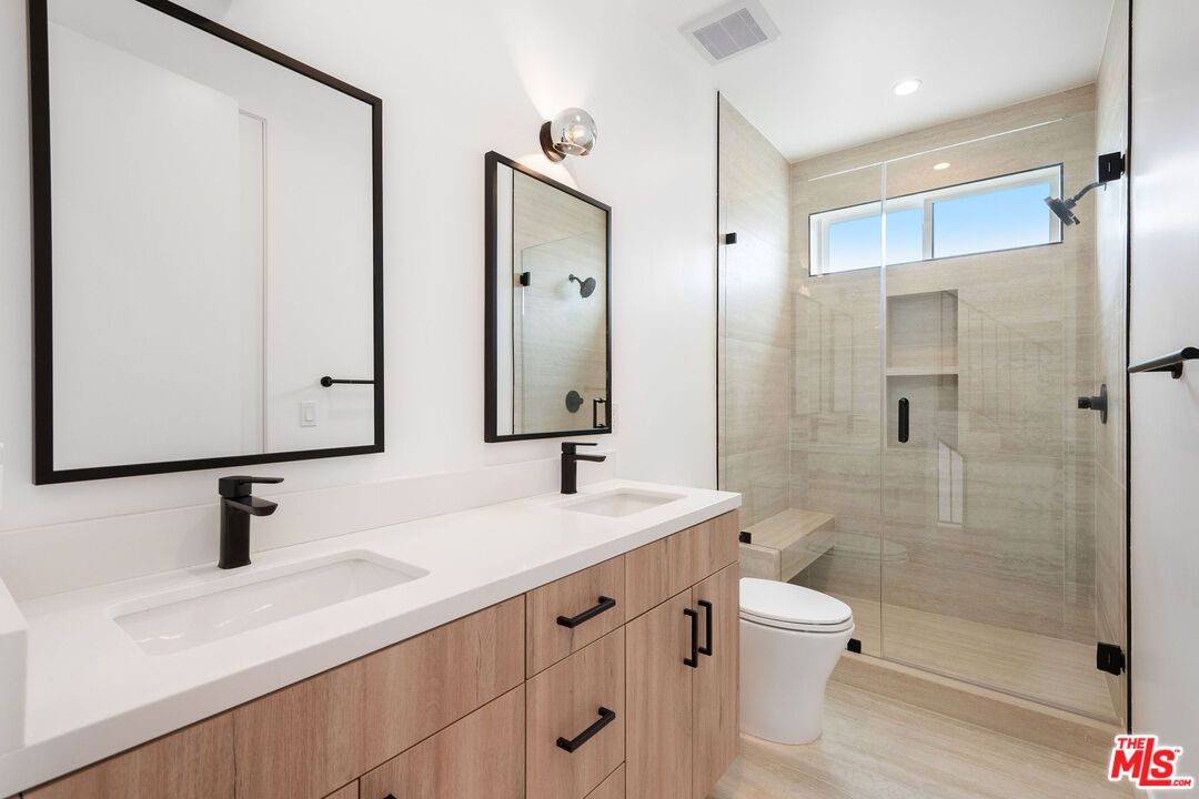 Bathroom, Dual Sink Vanities, Glass Shower, Interior, Recessed Lighting, Wood Texture Flooring