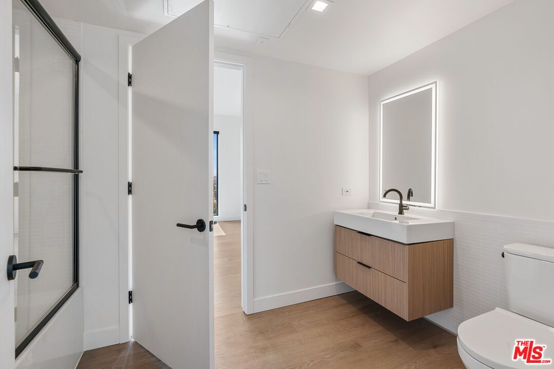 Bathroom, Glass Shower, Interior, Recessed Lighting, Wood Texture Flooring