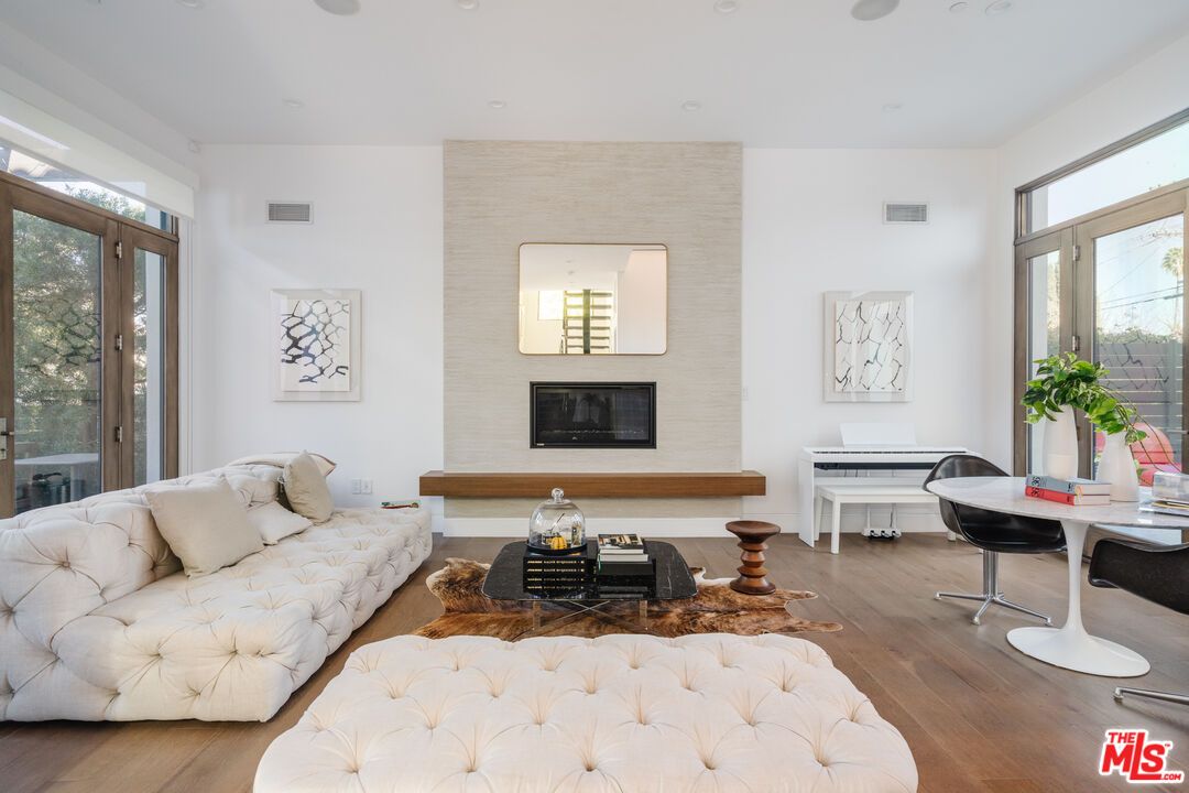 Fireplace, Interior, Living room, Piano, Recessed Lighting, Wood Texture Flooring