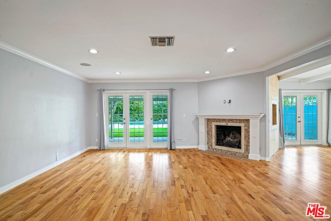 Empty room, Fireplace, Interior, Recessed Lighting, Wood Texture Flooring