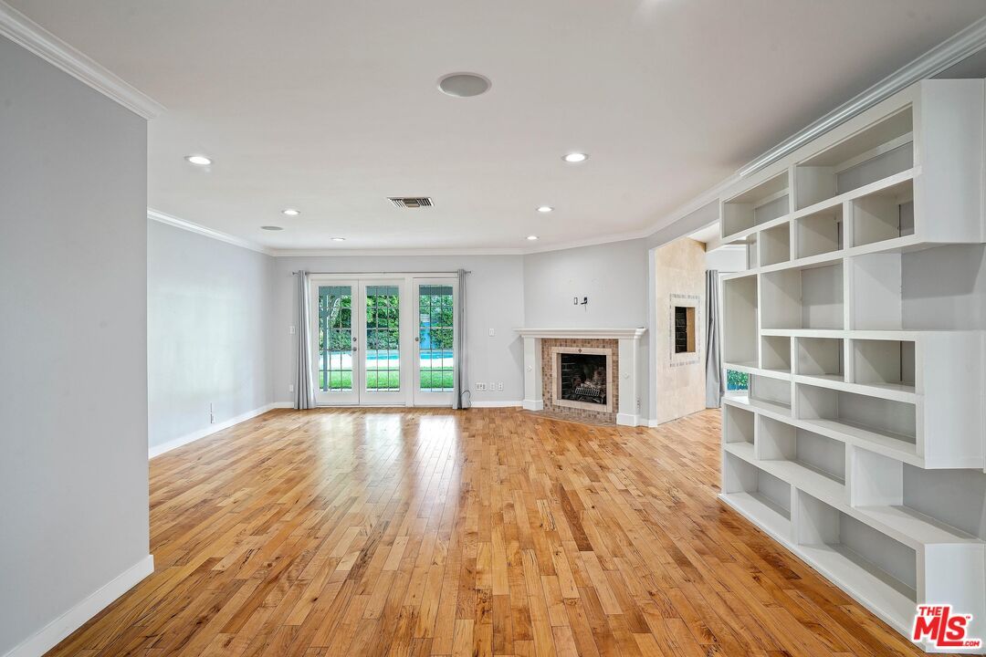 Empty room, Fireplace, Interior, Recessed Lighting, Wood Texture Flooring