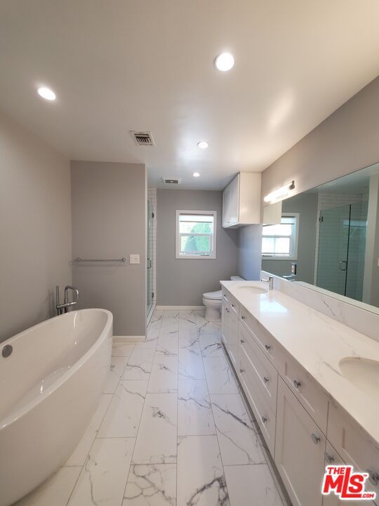 Bathroom, Dual Sink Vanities, Free Standing Baths, Interior, Marble, Recessed Lighting