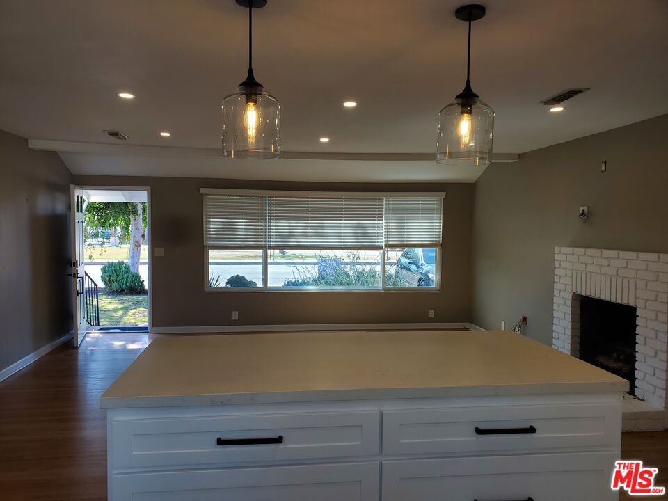 Fireplace, Interior, Pendant Lights, Recessed Lighting, Wood Texture Flooring