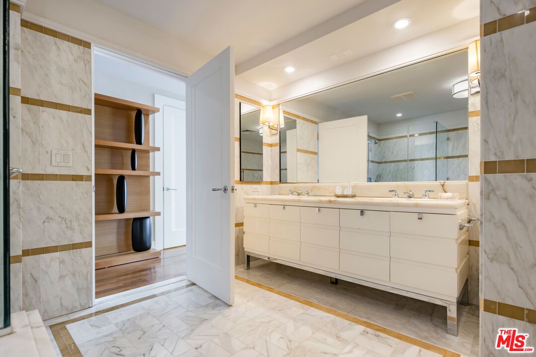 Bathroom, Dual Sink Vanities, Interior, Marble, Marble Walls, Recessed Lighting, Wood Texture Flooring