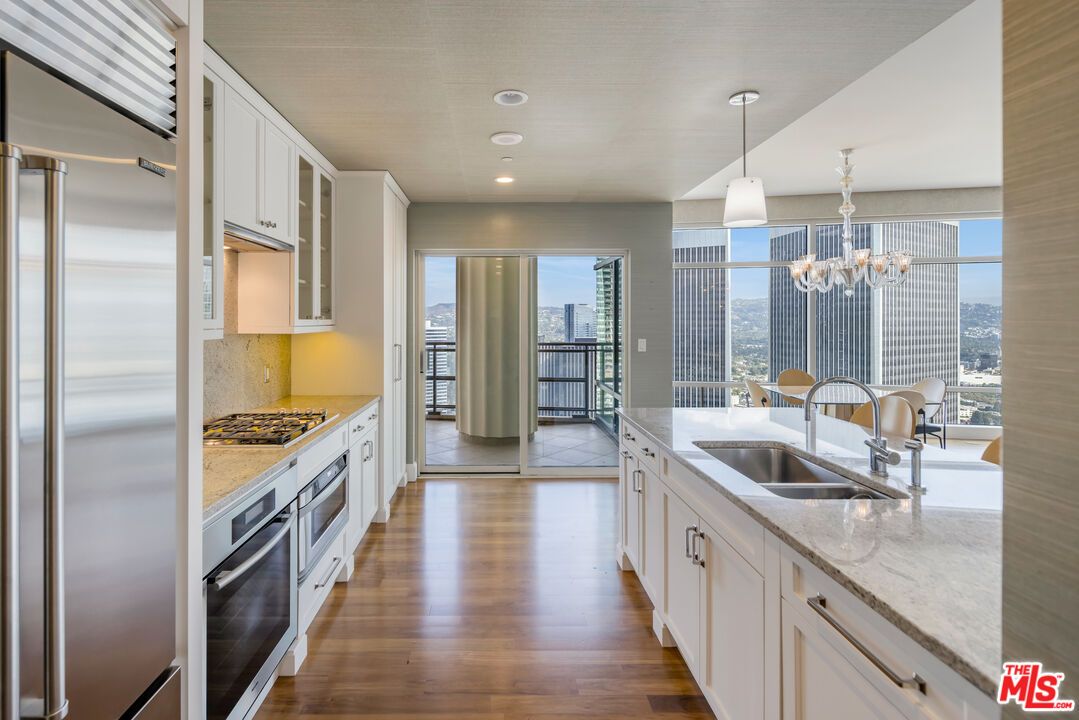 Chandelier, Interior, Kitchen, Pendant Lights, Recessed Lighting, Stainless Steel Appliances, Wood Texture Flooring