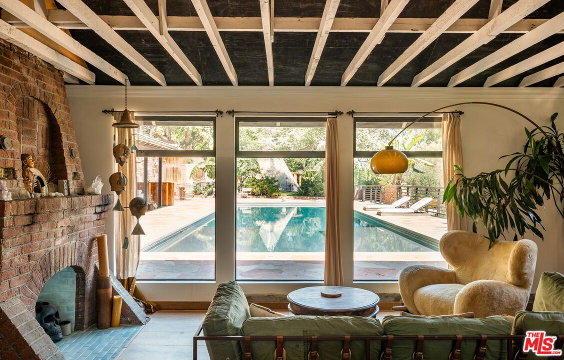 Fireplace, Interior, Pendant Lights, Pool, Stone Walls