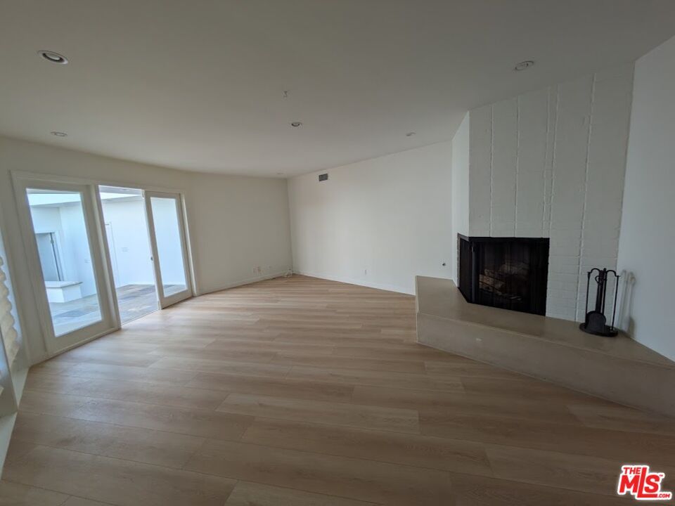 Empty room, Fireplace, Interior, Recessed Lighting, Wood Texture Flooring