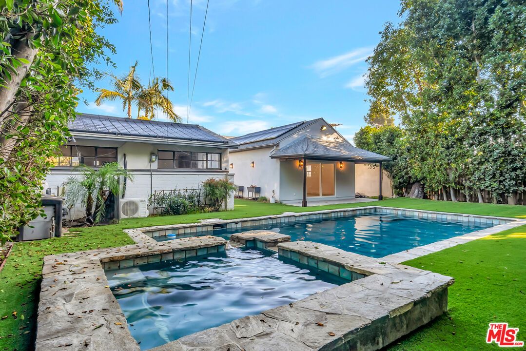 Exterior, Pool, Solar Panels