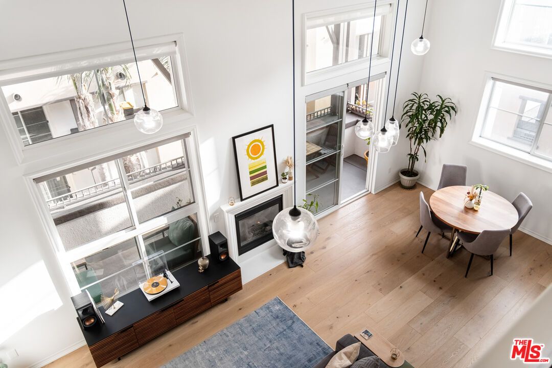 Dining room, Fireplace, Interior, Pendant Lights, Wood Texture Flooring