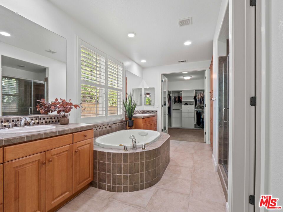 Bathroom, Dual Sink Vanities, Glass Shower, Interior, Recessed Lighting, Tile Countertops