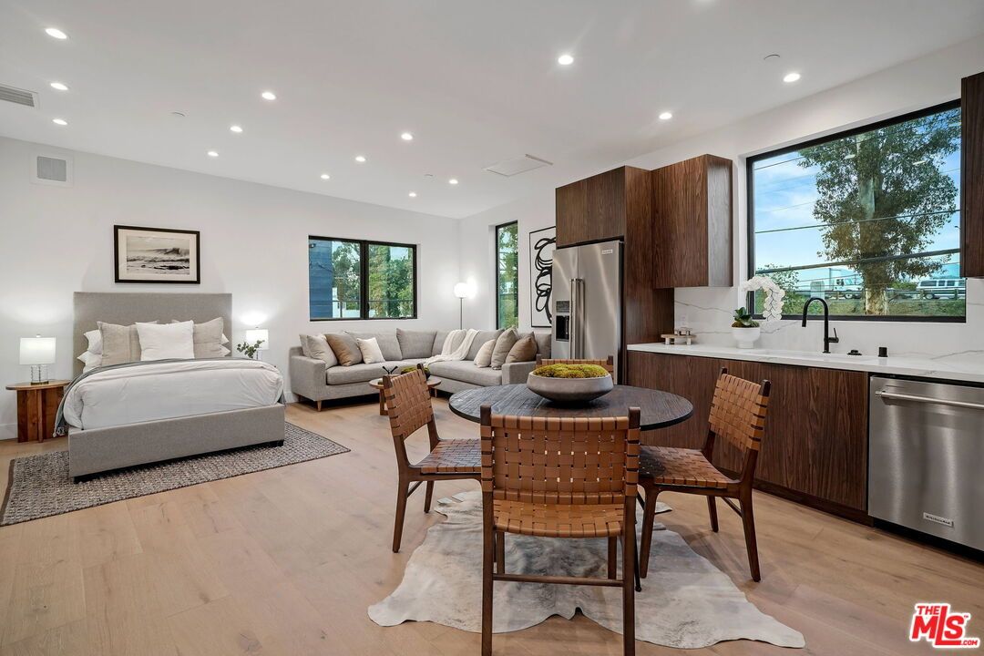 Bedroom, Dining room, Interior, Kitchen, Living room, Recessed Lighting, Stainless Steel Appliances, Wood Texture Flooring