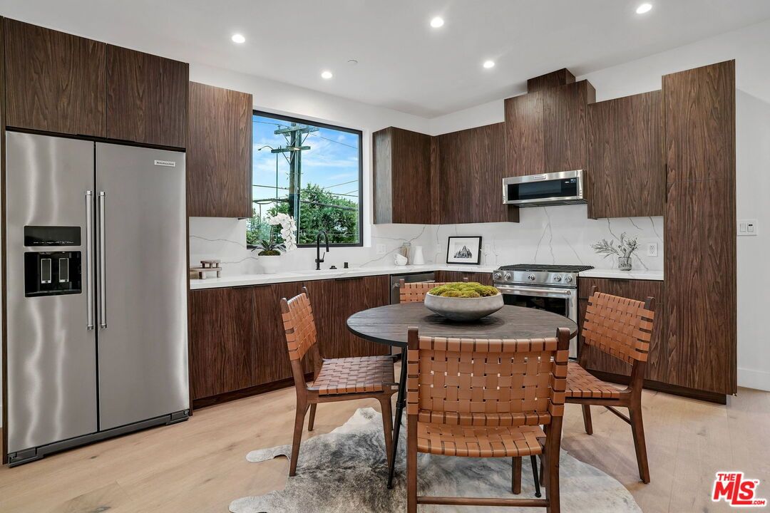 Dining room, Interior, Kitchen, Recessed Lighting, Stainless Steel Appliances, Wood Texture Flooring