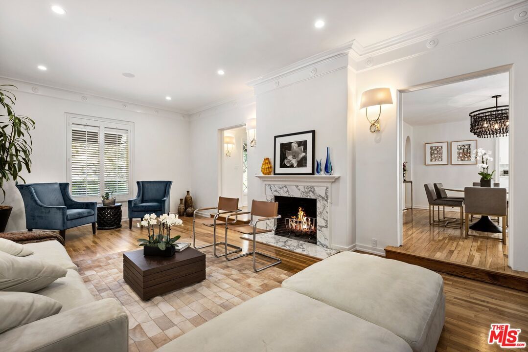 Chandelier, Dining room, Fireplace, Interior, Living room, Recessed Lighting, Wood Texture Flooring