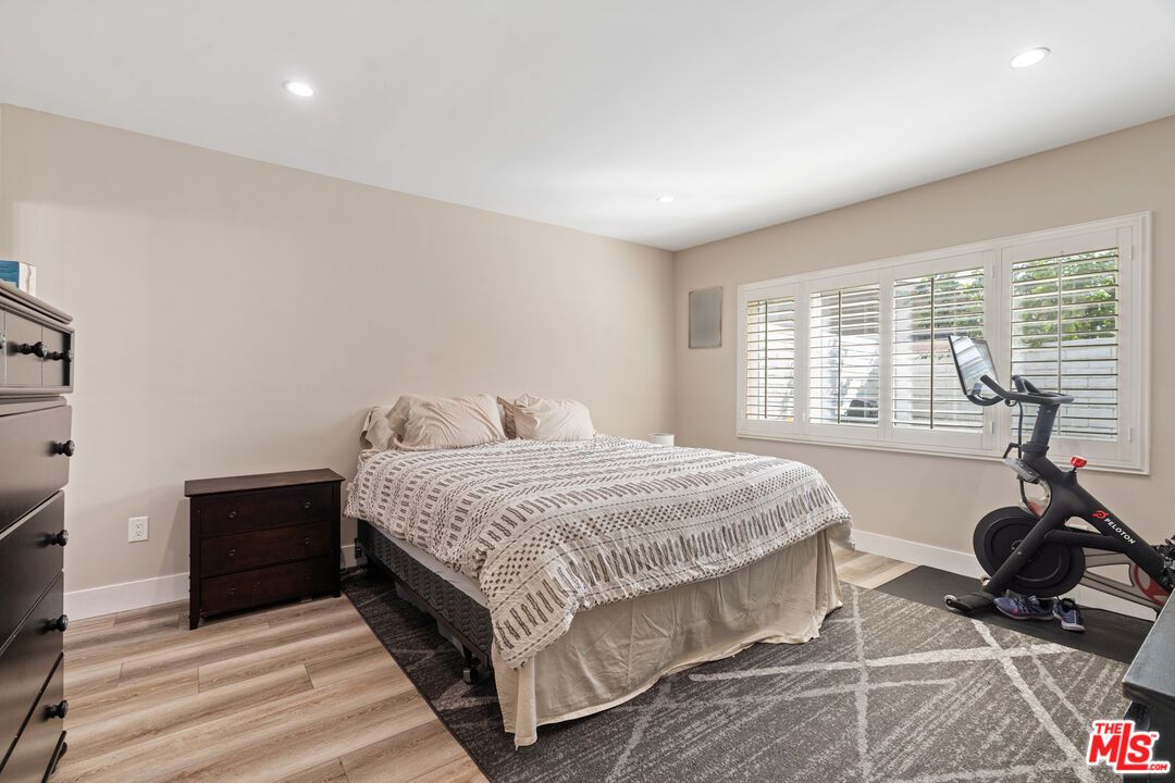 Bedroom, Fitness Equipment, Interior, Recessed Lighting, Wood Texture Flooring