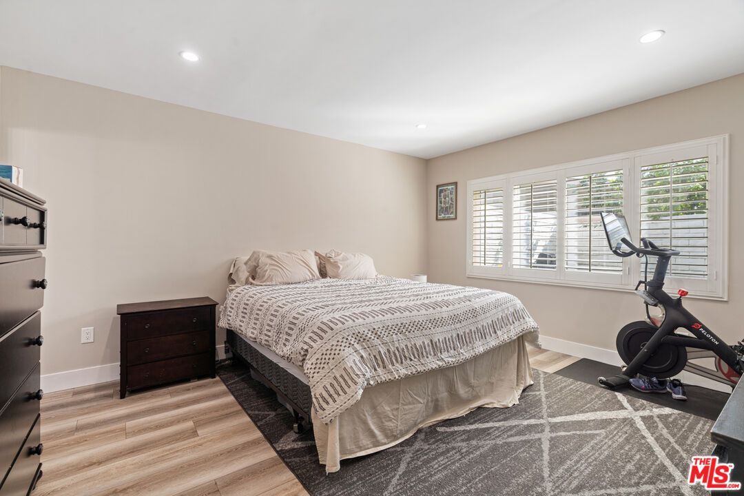 Bedroom, Fitness Equipment, Interior, Recessed Lighting, Wood Texture Flooring
