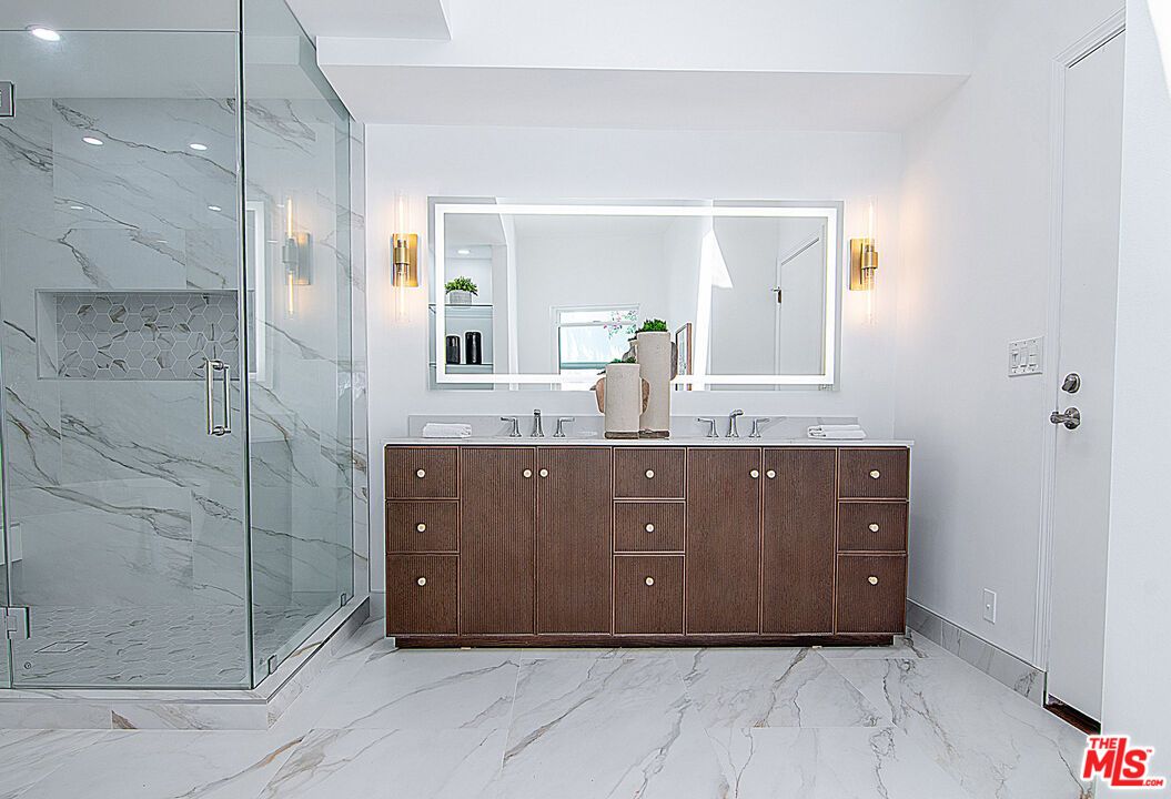 Bathroom, Dual Sink Vanities, Glass Shower, Interior, Marble, Marble Walls, Recessed Lighting