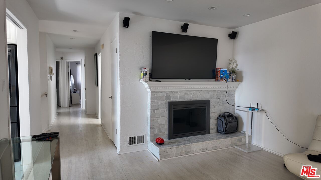 Fireplace, Interior, Recessed Lighting, Wood Texture Flooring