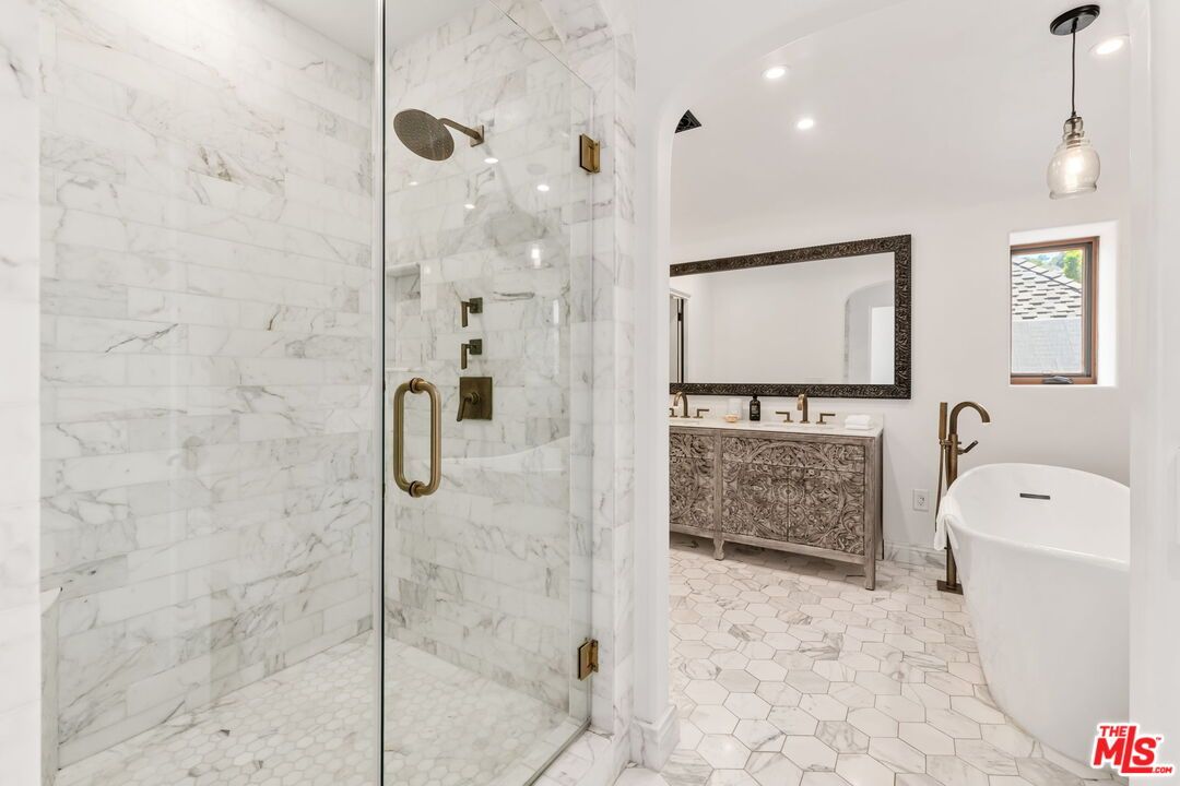 Bathroom, Dual Sink Vanities, Free Standing Baths, Glass Shower, Interior, Marble, Marble Walls, Pendant Lights, Recessed Lighting
