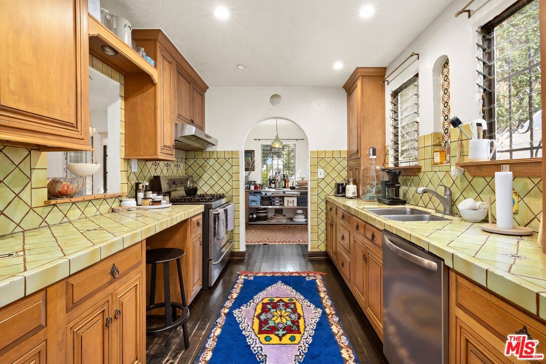 Interior, Kitchen, Pendant Lights, Recessed Lighting, Tile Countertops, Wood Texture Flooring