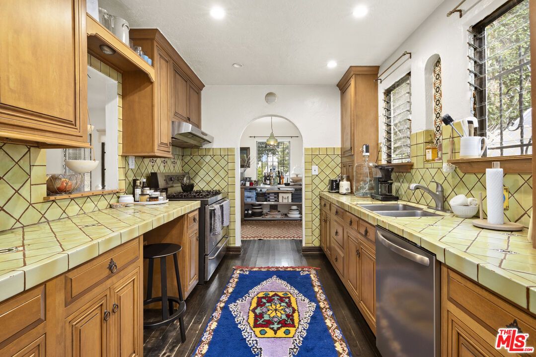 Interior, Kitchen, Pendant Lights, Recessed Lighting, Tile Countertops, Wood Texture Flooring