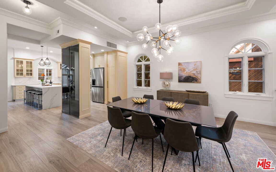 Dining room, Interior, Kitchen, Pendant Lights, Recessed Lighting, Stainless Steel Appliances, Wood Texture Flooring