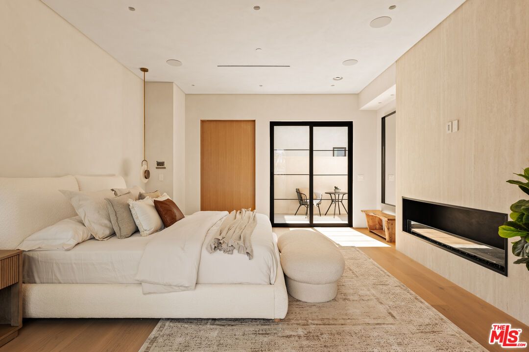 Bedroom, Fireplace, Interior, Recessed Lighting, Wood Texture Flooring