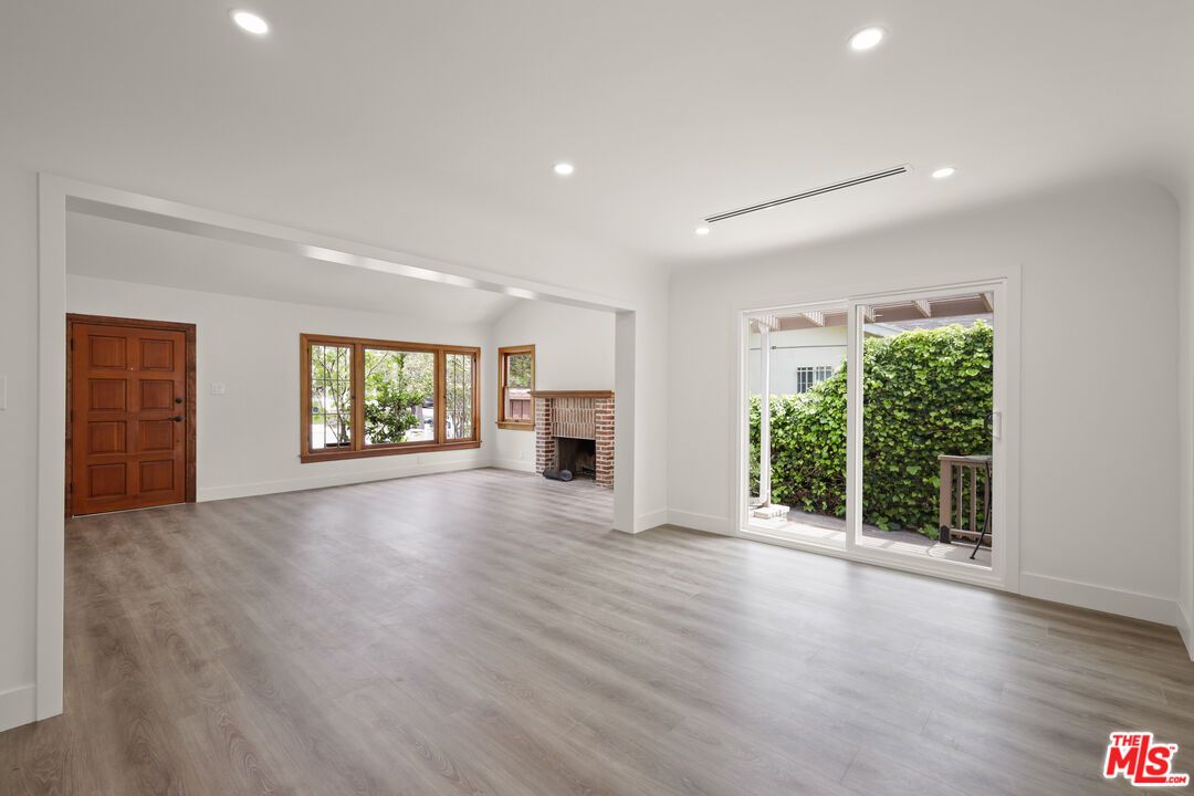 Empty room, Fireplace, Interior, Recessed Lighting, Wood Texture Flooring