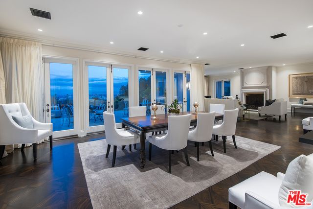 Dining room, Fireplace, Interior, Living room, Recessed Lighting, Water, Wood Texture Flooring