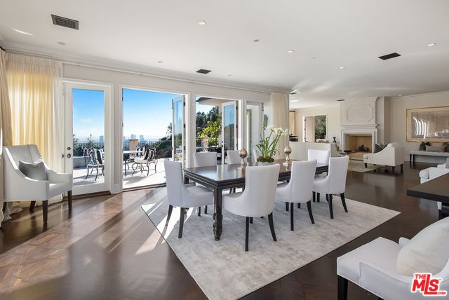 Dining room, Fireplace, Interior, Living room, Recessed Lighting, Wood Texture Flooring