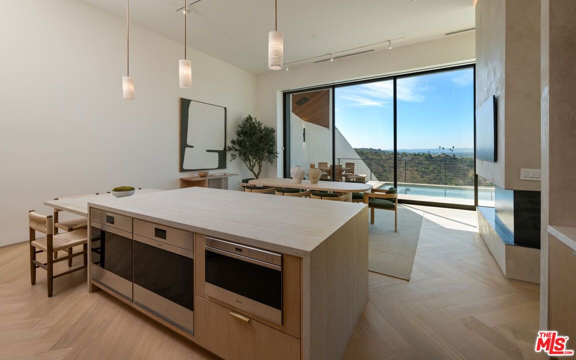 Dining room, Interior, Kitchen, Pendant Lights, Stainless Steel Appliances, Water, Wood Texture Flooring