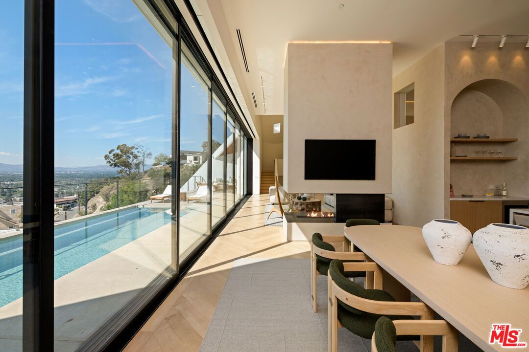 Dining room, Fireplace, Interior, Pool, Wood Texture Flooring