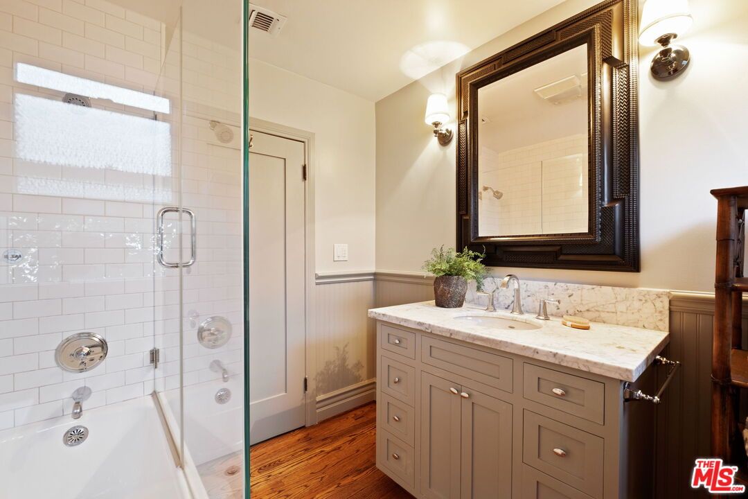 Bathroom, Dual Sink Vanities, Glass Shower, Interior, Wood Texture Flooring