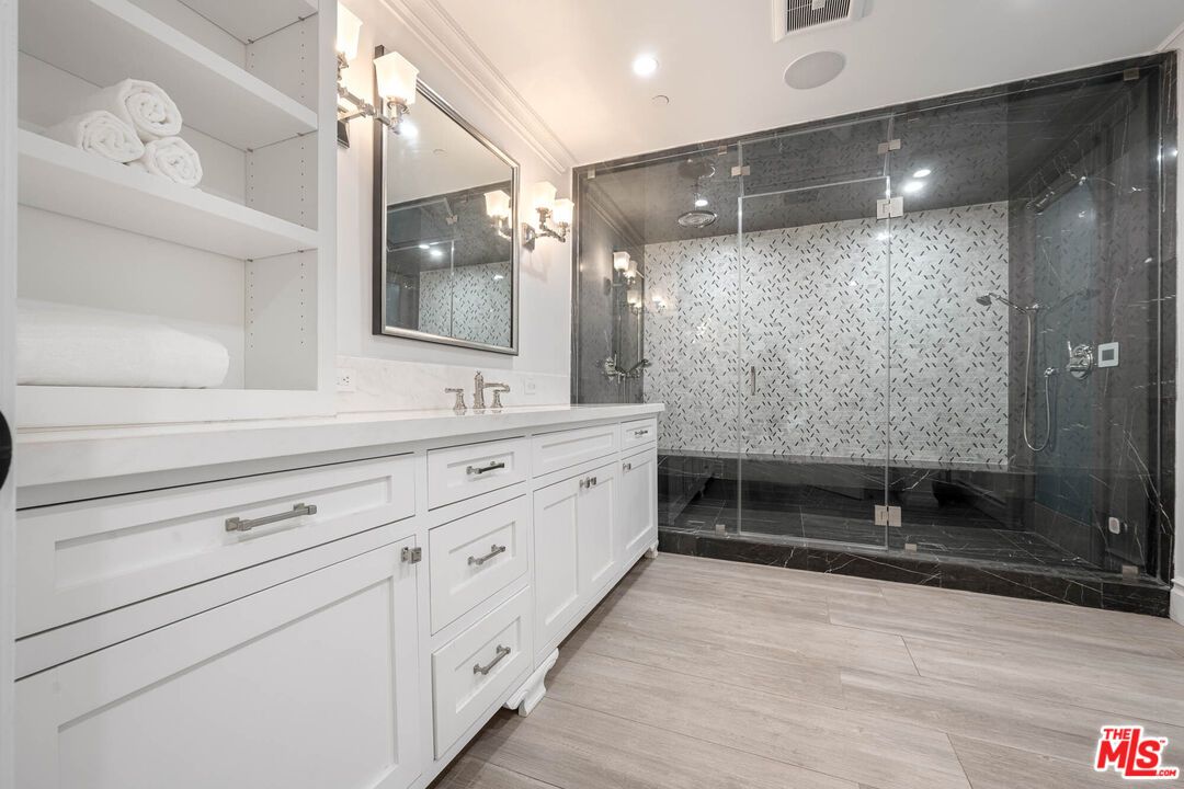 Bathroom, Dual Sink Vanities, Glass Shower, Interior, Marble Walls, Recessed Lighting