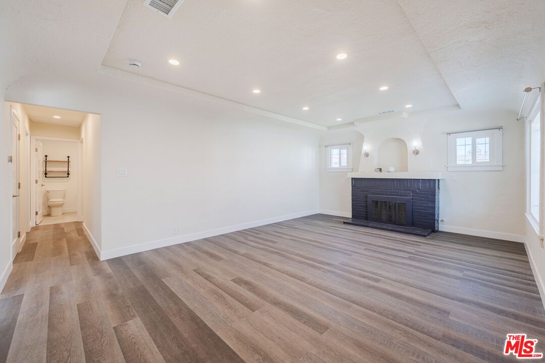 Empty room, Fireplace, Interior, Recessed Lighting, Wood Texture Flooring